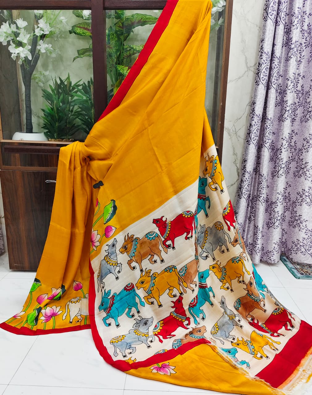 Mustard Yellow Silk Saree with Hand-Painted Kalamkari Cow & Lotus Motifs